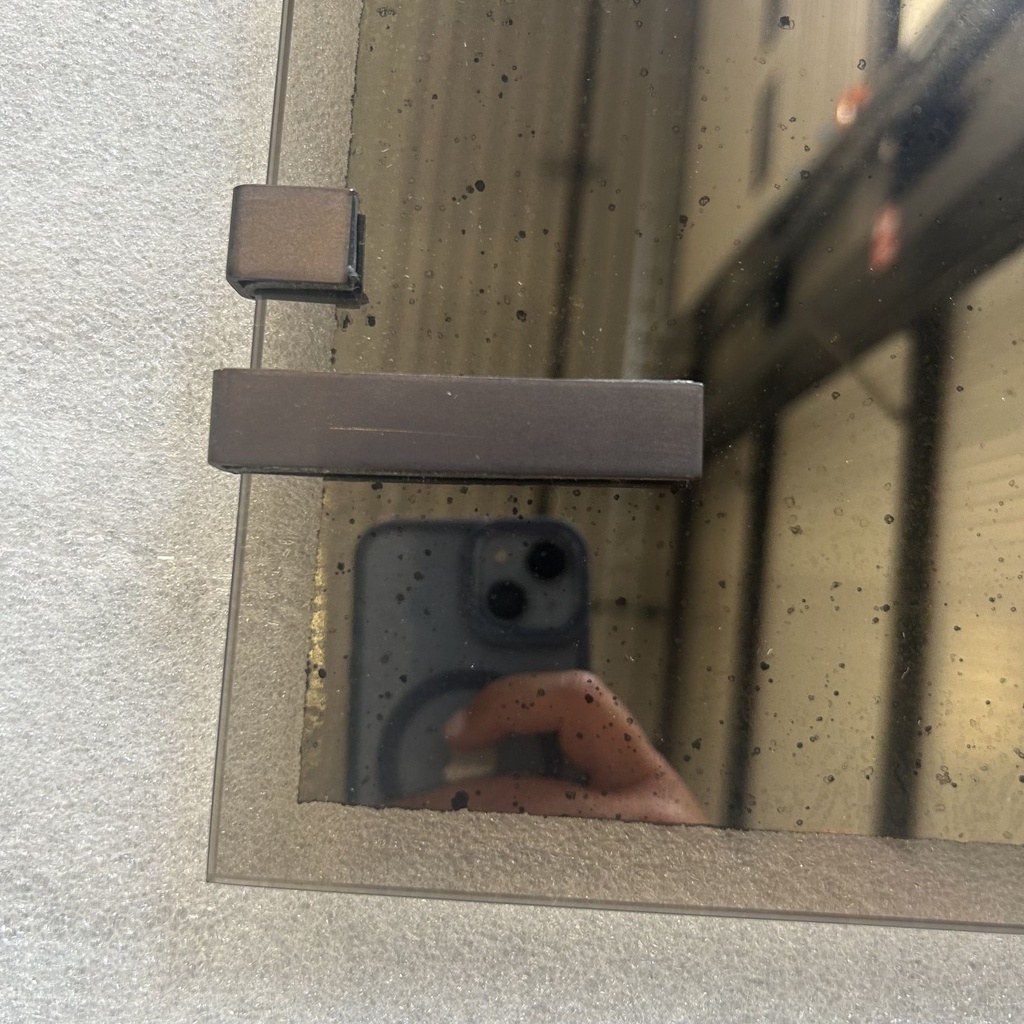 Frameless wall mirror