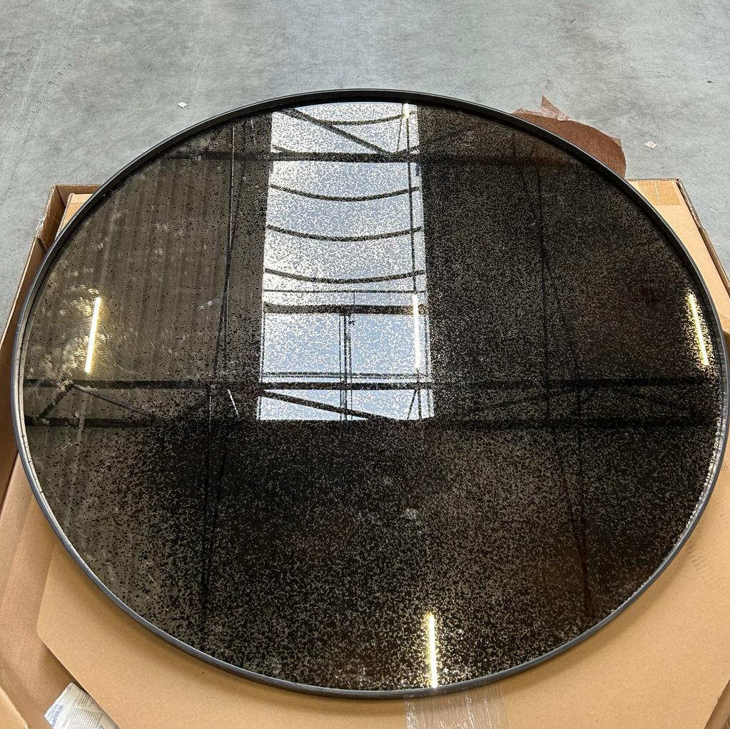 Aged wall mirror