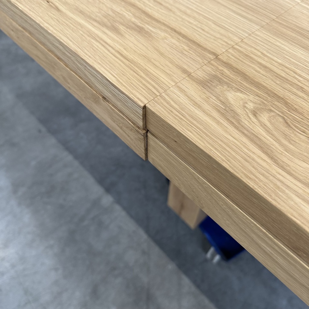 Double extendable dining table
