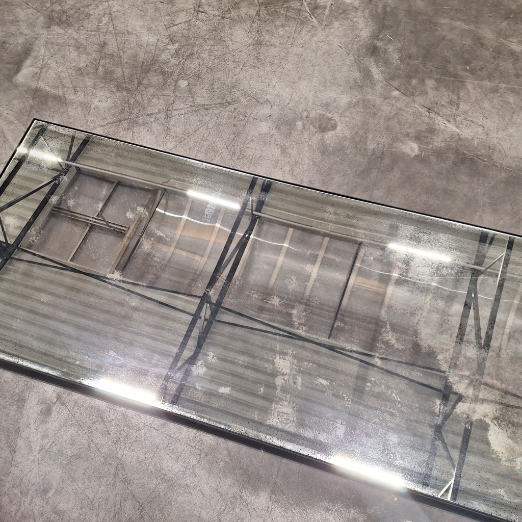 Aged floor mirror