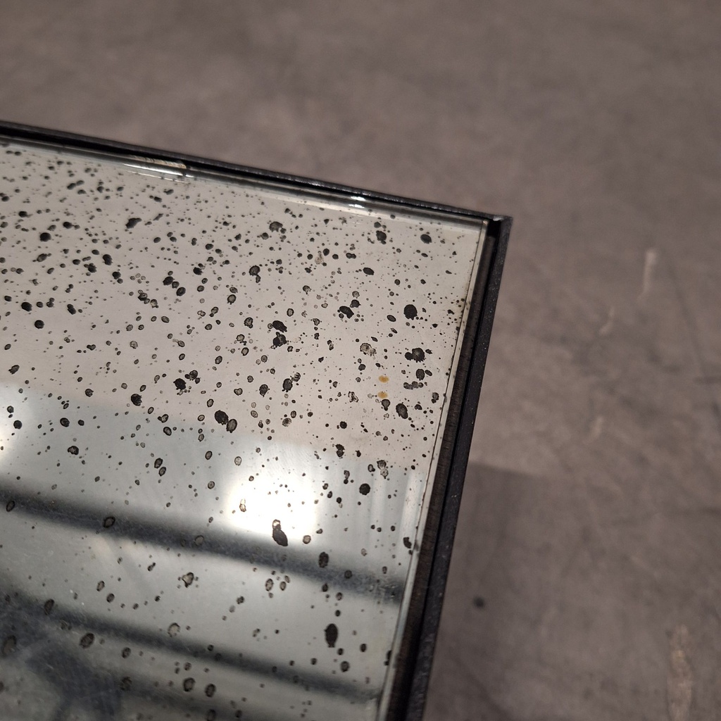 Aged floor mirror