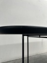 Arc dining table